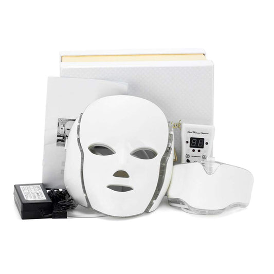 White LED face mask with power adapter on a white background