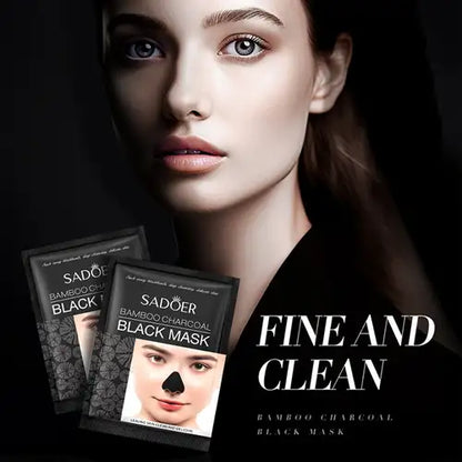 Two packets of Sadoer Bamboo Charcoal Black Mask shown in front of a close-up portrait of a woman with a black face mask applied, on a dark background with the text 'FINE AND CLEAN' and 'BAMBOO CHARCOAL BLACK MASK'.